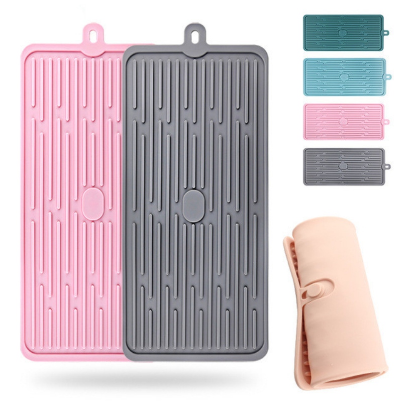 배수 패드를 고정하는 직사각형 버튼